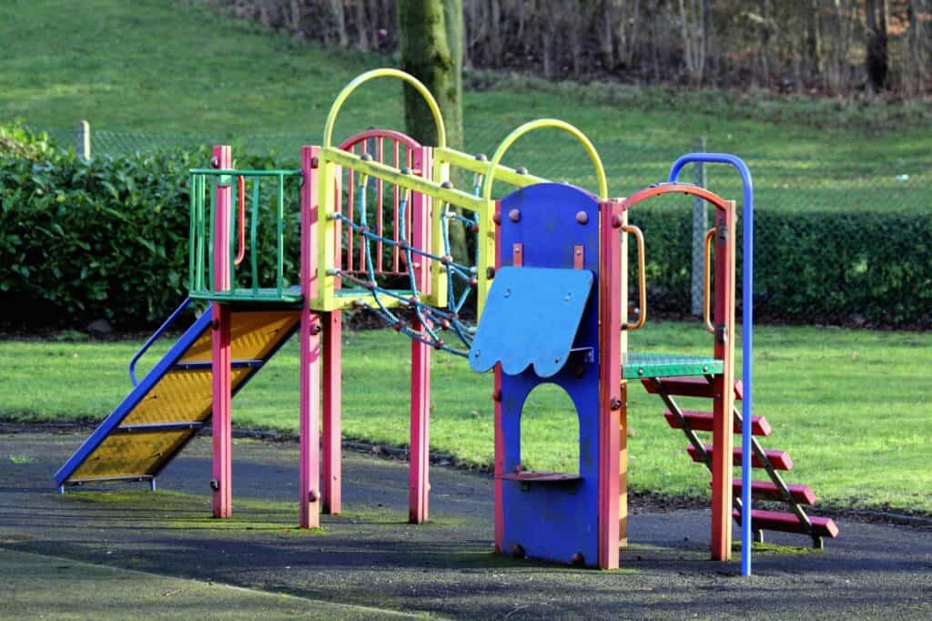 A tiny and empty children's playground in a park