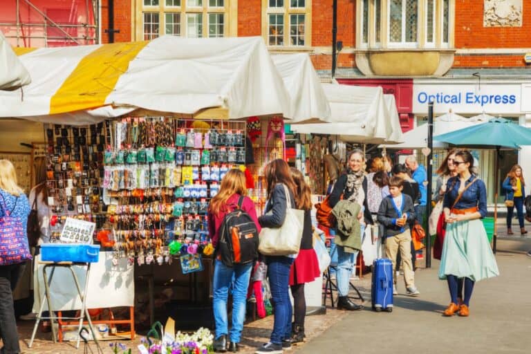 Souvenir shops at a street market in the concept of local shops and markets in Lewisham.