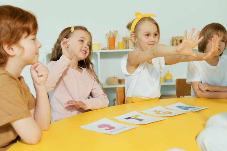 Young students actively participating in the class in the concept of 'top schools in Lewisham'.